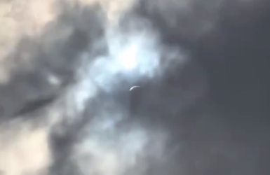 Flying Saucer Caught On Video Clear As Day During The Eclipse or Was It Project Blue Beam, It Disappeared Didn’t It?