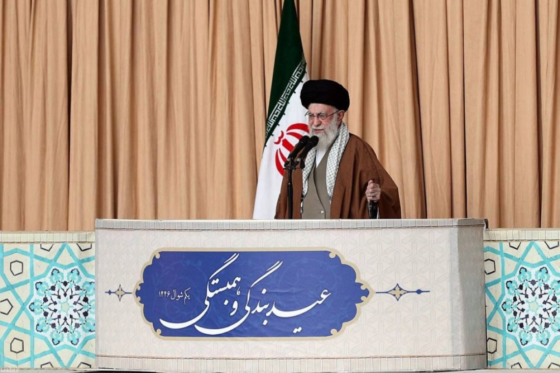 Iran Supreme Leader Gives Speech – Holding Army Rifle!
